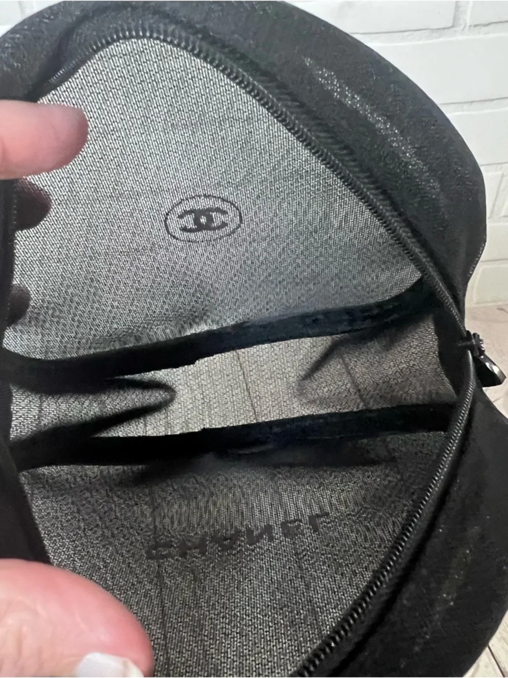 CHANEL Black Round Mesh Cosmetic Zip Bag.